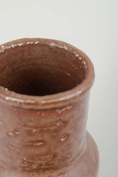 European Studio Ceramicist. Cylindrical vase with brown glaze. 1970s