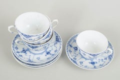 Royal Copenhagen, Blue Fluted Half Lace. Set of 4 chocolate cups with saucers.