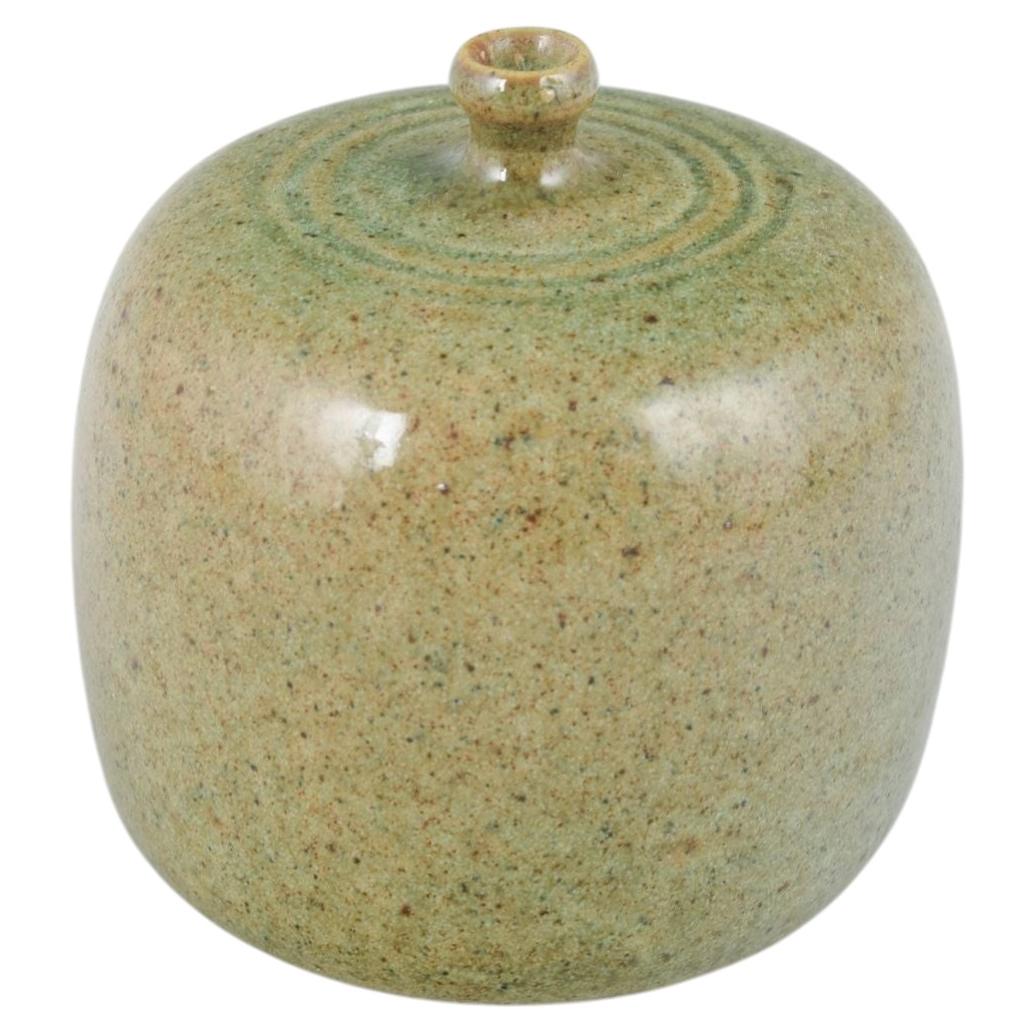 Swedish studio ceramicist. Small stoneware vase with rounded cylindrical form. For Sale