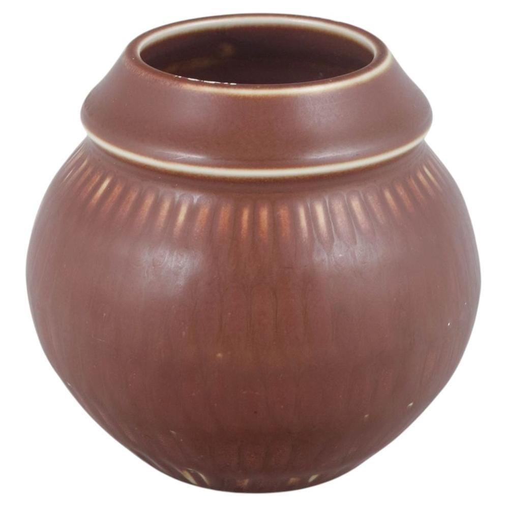 Rörstrand. Bulbous stoneware vase with subtle vertical ribbing. Mid-20th C. For Sale