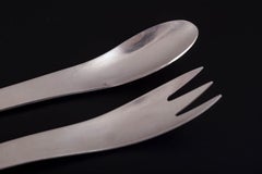 Arne Jacobsen for Anton Michelsen. Salad serving set in stainless steel.