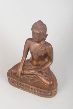 Seated Buddha figure in patinated bronze with classical meditative pose. 19th C