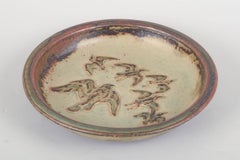 Knud Kyhn for Royal Copenhagen. Stoneware dish with flock of birds in relief.
