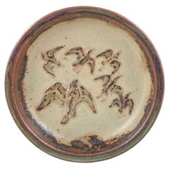 Knud Kyhn for Royal Copenhagen. Stoneware dish with flock of birds in relief.