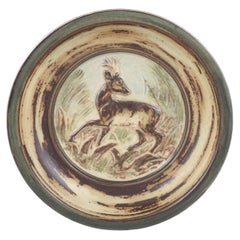 Knud Kyhn for Royal Copenhagen. Round stoneware dish with relief of deer. 1970s
