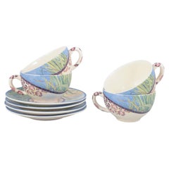 Gien, "Savane". Set of four large morning cups with matching saucers.