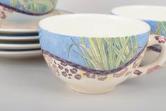 Gien, "Savane". Set of four large morning cups with matching saucers.