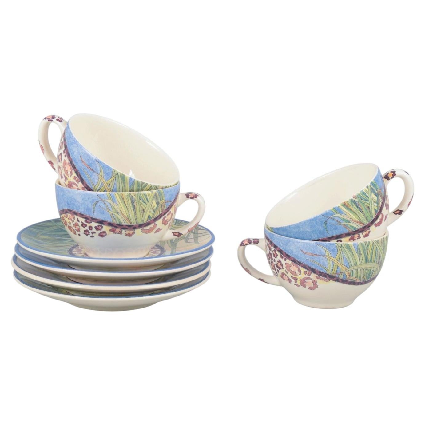 Gien, "Savane". Set of four faience coffee cups with matching saucers. For Sale