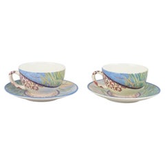 Gien, "Savane". Pair of faience coffee cups with matching saucers.