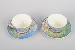Gien, "Savane". Pair of faience coffee cups with matching saucers.