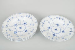 Royal Copenhagen, Blue Fluted Plain. Four deep porcelain plates. 1920s-1940s