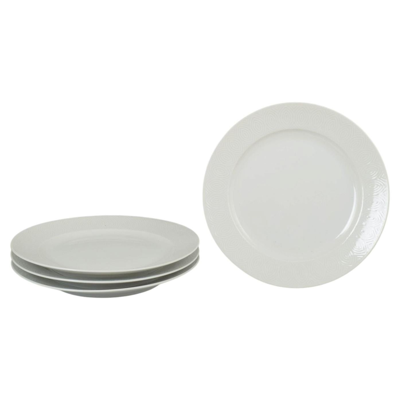 Axel Salto for Royal Copenhagen. Set of four porcelain dinner plates. 1970s.