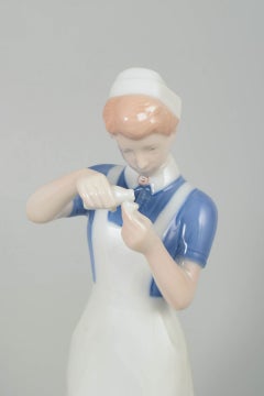 Bing & Grøndahl. Porcelain figurine of nurse in uniform. 1970s