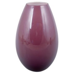 Peter Svarrer for Holmegaard. “Cocoon” vase in deep purple glass. Late 20th C.