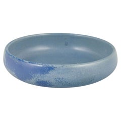 L. Hjorth, Bornholm. Low stoneware bowl with matte blue glaze, 1960s