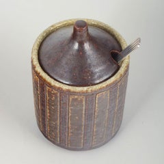 Palshus, Denmark. Ceramic jam jar with silver spoon, 1970s.