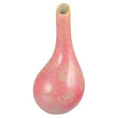 Hans Hedberg for Biot. Drop-shaped vase with pink and yellow marbled glaze.