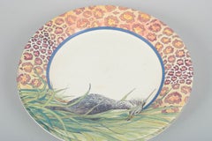 Gien, France. “Savane”, set of three large dinner plates in faience, 1980s.