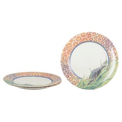 Gien, France. “Savane”, set of three large dinner plates in faience, 1980s.