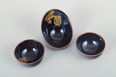 Gustavsberg. Three miniature bowls in deep blue glaze. Mid-20th Century.