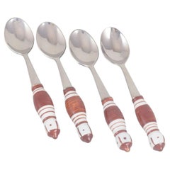 Bjørn Wiinblad for Rosenthal. Four teaspoons in stainless steel and porcelain.