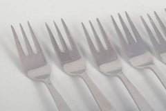 Bjørn Wiinblad for Rosenthal. Six cake forks in stainless steel and porcelain.