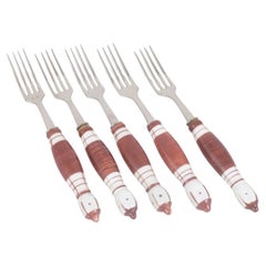 Bjørn Wiinblad, Rosenthal. Five dinner forks in stainless steel and porcelain