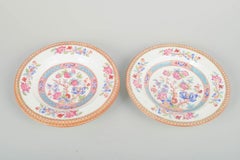 Cauldon China, England. Three deep faience plates with oriental pattern.