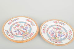 Cauldon China, England. Four faience plates with oriental floral pattern.