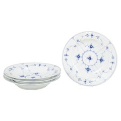 Royal Copenhagen, Blue Fluted Plain. Four deep plates in porcelain. 1920s