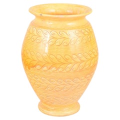 Kähler. Tall yellow-orange ceramic vase with incised leaf pattern, 1930s