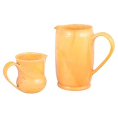 Kähler, Denmark. Two large ceramic pitchers. Yellow-orange glaze. 1930s