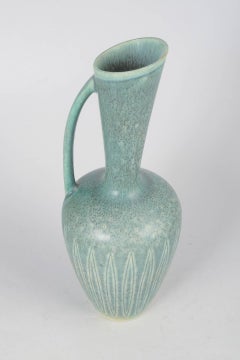 Gunnar Nylund, Rörstrand. Ceramic pitcher with turquoise-green hare’s fur glaze.