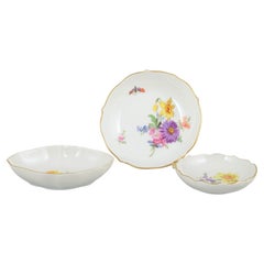Meissen, Germany. Three small porcelain dishes with floral motifs, early 20th C