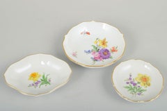 Meissen, Germany. Three small porcelain dishes with floral motifs, early 20th C