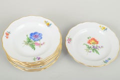 Meissen, Germany. Set of seven side dishes in porcelain with floral motifs.
