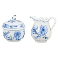Meissen. Set of "Blue Onion" sugar bowl and creamer in porcelain, mid-20th C.