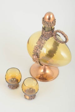 Pentti Sarpaneva. Decanter and two glasses with bronze/copper mounts, 1970s.