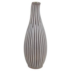 Helge Østerberg. Slender stoneware vase with striped pattern. 1970s