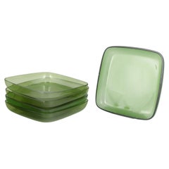 Set of five plates in green art glass. Sweden, 1960s/70s