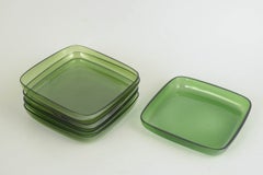 Set of five plates in green art glass. Sweden, 1960s/70s