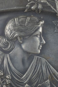 WMF, Germany. Large Art Nouveau wall platter / dish with female figure. Ca. 1900