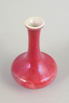 Kähler, Denmark. Slim-necked stoneware vase with rare deep red glaze, 1910s/20s.