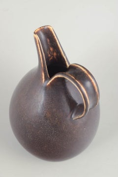 Eva Stæhr-Nielsen for Saxbo, Denmark. Large stoneware jug with brown glaze.