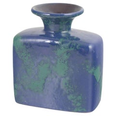 European studio ceramicist. Ceramic vase with glossy blue and green glaze.