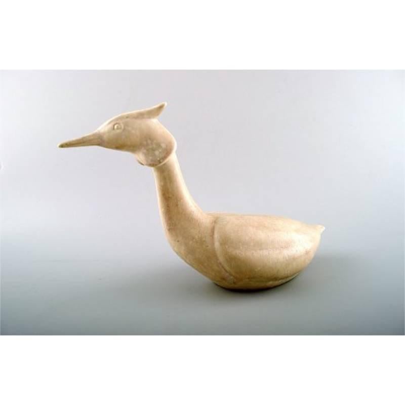 Rörstrand / Rorstand stoneware figure by Gunnar Nylund, great crested grebe.
Eggshell glaze.
In perfect condition. 1st. factory quality.
Measures: 27 x 14 cm.