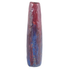 European studio ceramicist. Tall ceramic vase with red and blue glaze. 1964