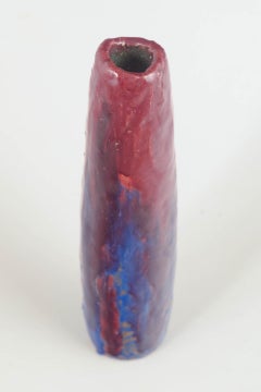 European studio ceramicist. Tall ceramic vase with red and blue glaze. 1964