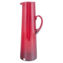Monica Bratt for Reijmyre. Tall pitcher in deep ruby-red glass, 1950s