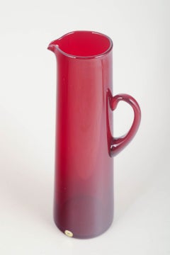 Monica Bratt for Reijmyre. Tall pitcher in deep ruby-red glass, 1950s